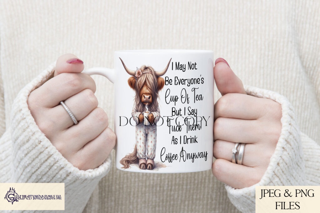 Highland cow holding a mug of coffee with a humorous quote.